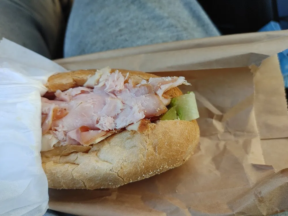 Ham and Turkey and Cheese with Mayo Lettuce Tomato and Pickles